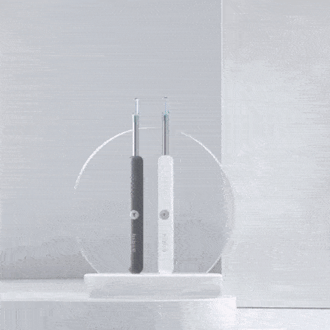 Global Prime Essential Smart Ear Wax Remover shown in use, featuring a sleek design with gentle tips for safe ear cleaning.