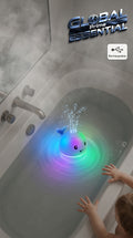 Rechargeable whale-shaped baby bath toy from Global Prime Essential, featuring light-up functionality for underwater play.
