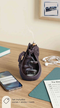 Ceramic dragon backflow incense burner set with waterfall effect, includes 45 cones and 40 sticks for calming incense burning.