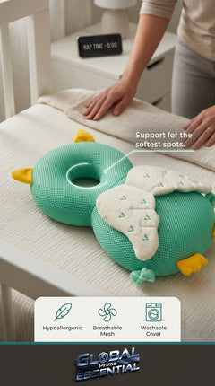 Global Prime Essential newborn protection pillow, a baby accessory with quiet comfort for peaceful naps.