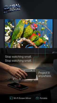 Mini LED wireless projector by Global Prime Essential displaying a large image on a wall in a home theater setting.